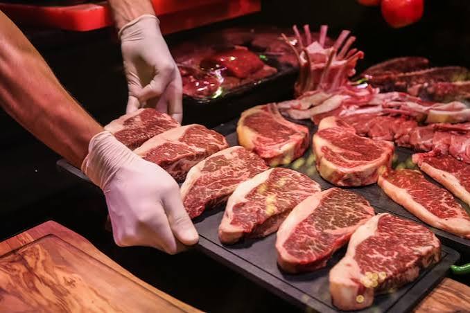 Careful preparation of premium meat cuts